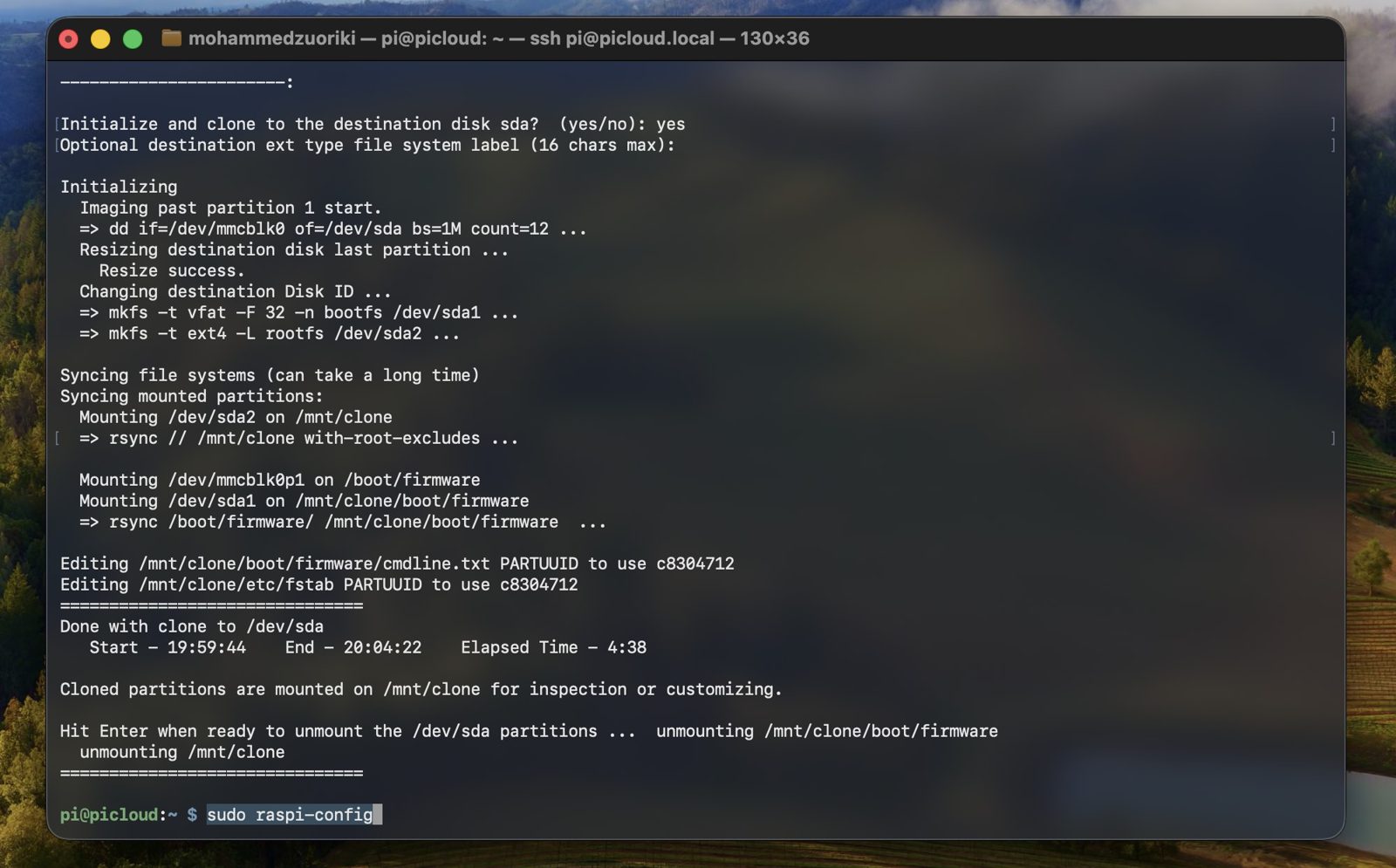 rpi-clone finishing the sync, updating PARTUUID references, and reporting "Done with clone to /dev/sda" with elapsed time 4:38